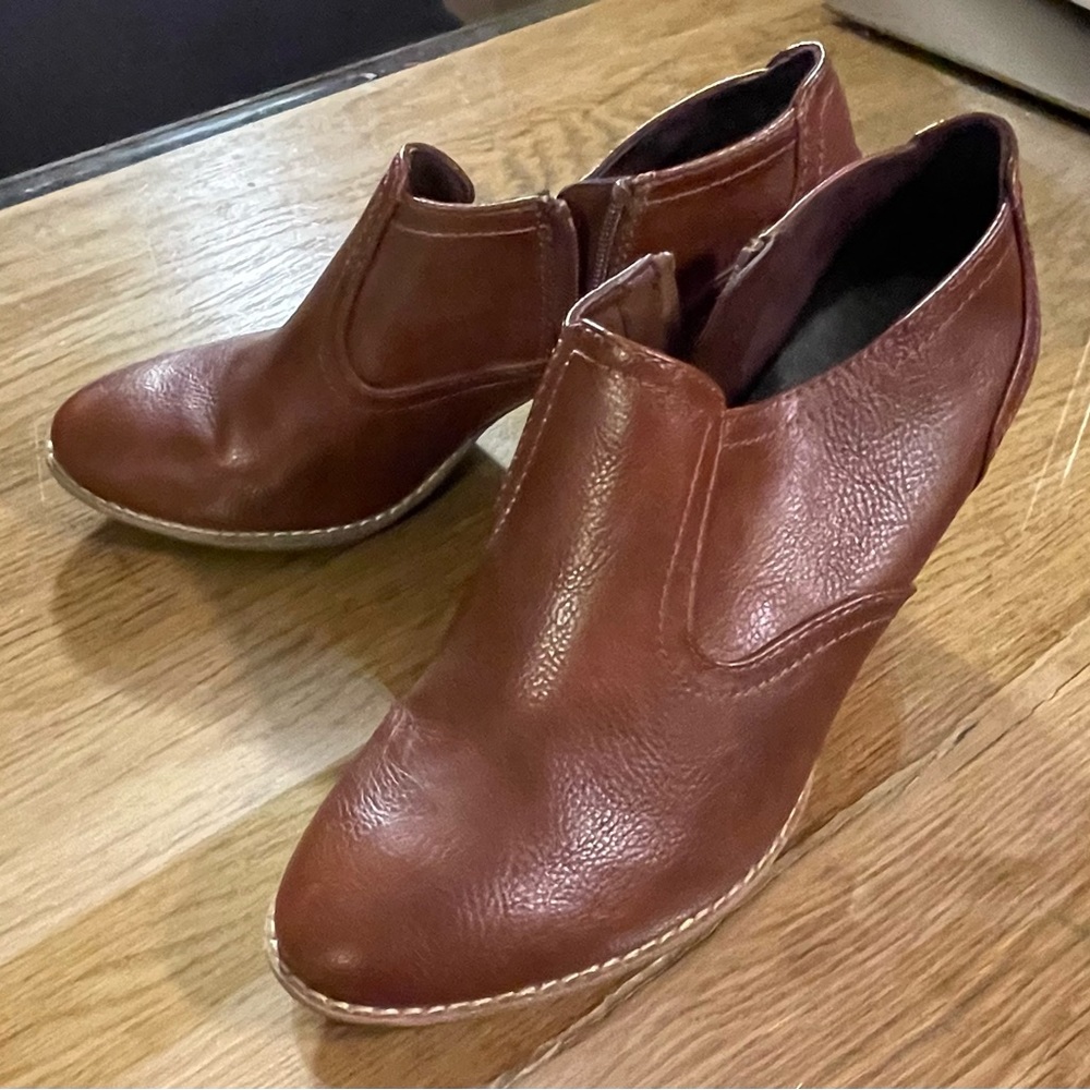 Faux leather Dr Scholl’s booties size 10M with zippers. Only worn a few times